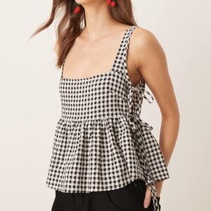 ASOS DESIGN tie side babydoll tank top in black and white gingham